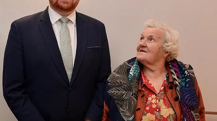 In the long and the short of it, Kathleen ‘Mason’ Murphy looking up to the top man at the Schull Harbour Hotel, manager Eugene McNamara, who will be moving to new pastures at the end of the year.