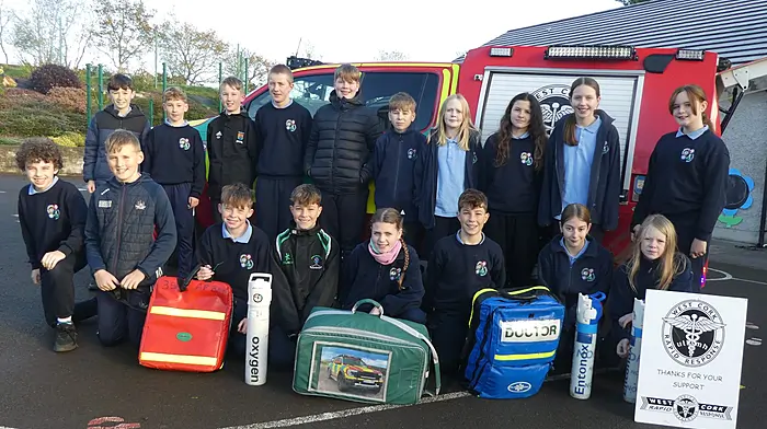 Sixth class students from Ballinadee Primary School viewing some of the emergency medical equipment on board the West Cork Rapid Response vehicle when it recently visited their school.