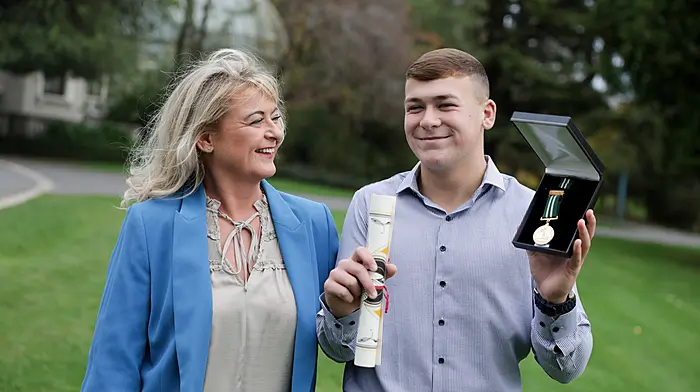 David Akar with his mum Pamela Cregan at the National Bravery Awards which were held at Farmleigh House in Dublin. David was awarded a gold medal and certificate of bravery when some friends he was swimming with at the Mariners Quay at Passage West got into difficulties in a strong current. David saved one by pushing him back to safety and tried tirelessly to save another, who unfortunately lost his life.   (Photo: Tony Maxwell)
