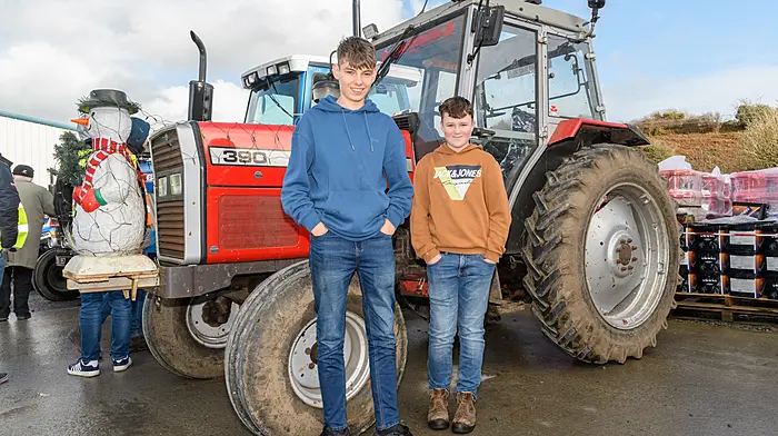Barry Murray and Nathan Mallon, both from Durrus, enjoying their day at Bantry Macra’s annual Christmas lights tractor run. The run this year was held in memory club member Michael Lynch. All proceeds from the day are in aid of Pieta House and the Samaritans.   (Photo: David Patterson)