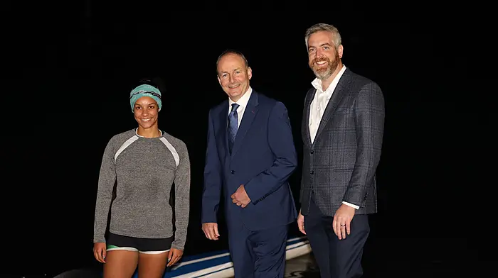 Skibbereen Rowing Club’s Kelly O’Donovan with Tánaiste Micheál Martin and Christopher O'Sullivan TD, when they visited the club last week.