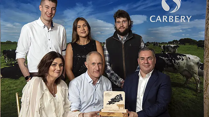 Jim and Frances Pyburn of Dunbeacon, Durrus, receiving their award from Jason Hawkins (ceo, Carbery Group), at the Carbery Milk Quality and Sustainability Awards which were held in Clonakilty. Included are their family Shane, Lynn and Alan.    (Photo: Don MacMonagle)