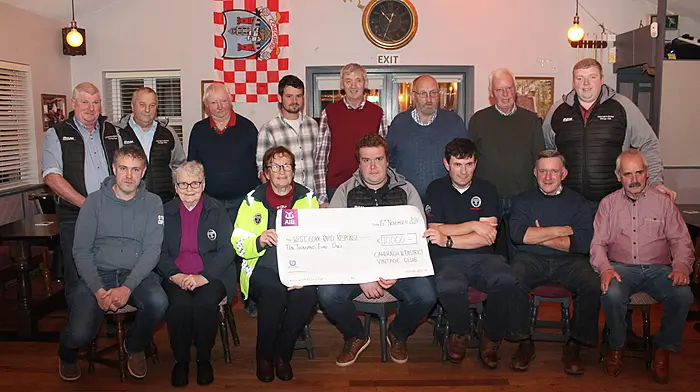 Caheragh and District Vintage Club presented a cheque of €10,000 to the West Cork Rapid Response at a ceremony at the Traveller’s Rest.  The money was the proceeds of the tractor, car, and truck run held in September. Front (from left): Sean Casey, Anne O’Sullivan (WCRR), Betty Hennessy (WCRR), Humphrey O’Sullivan, Tadhg Murray (WCRR), Pat Dineen and P J Murphy. Back (from left): D J Dineen, Anthony O’Driscoll, Seamus McCarthy, Alan Murphy, Pat McCarthy, Tim O’Sullivan, John Collins and Brian O’Sullivan.