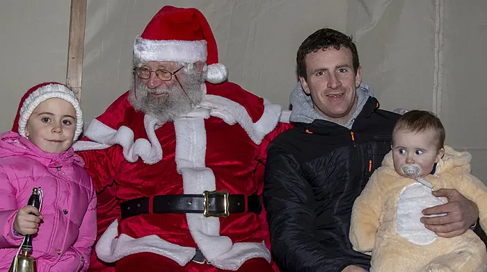 Angela, Johnny, and Jack O’Regan meet Santa Claus in Union Hall.