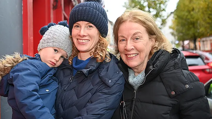 Ardfield’s Tadhg Sutton with Aoife and Mary Delaney out and about in Pearse Street, Clonakilty.  Photo: Martin Walsh.