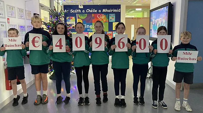 Gaelscoil Mhichíl Uí Choileáin Comhairle na nDaltaí (Students Council), celebrate over €4,000 donated by families into the UNICEF Gaza Children's Appeal organised by the school for December, which is Mí Cineáltas (Kindness Month) at the school.