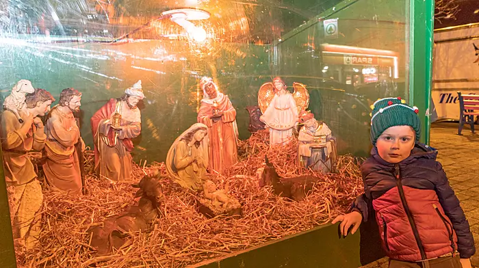 Iarlaith Cronin admiring the crib in Castletownbere Picture: Anne Marie Cronin Photography