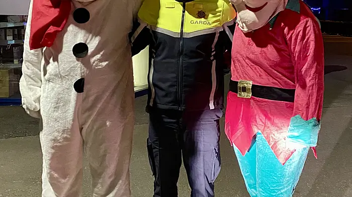 Mr Snowman with Garda Paul Gleason and Miss Elf