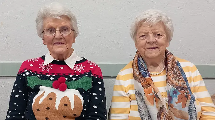 Local ladies Ina Helen and Annie O'Regan look festive as they enjoy the Active Retired Christmas party in Ballinascarthy hall.