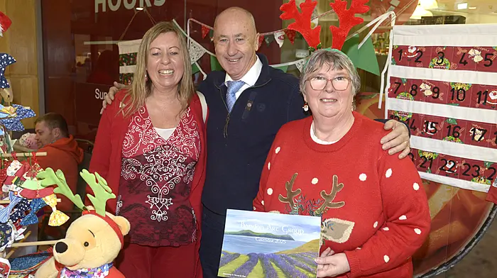 At the Bandon Christmas market at Riverview shopping centre was Cllr Alan Coleman with Isla Jeffers member of Glasslynn choir and Evelyn Drapper, Bandon art group. Photo: Denis Boyle