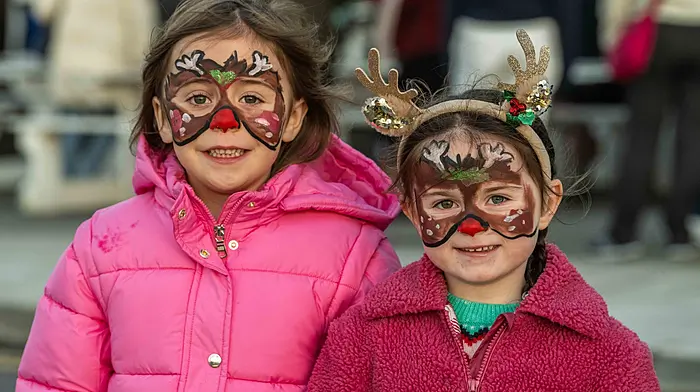 Angela O'Regan and Alannah Goggin, both from Baltimore, had their faces painted to celebrate the recent events. Photo: Andy Gibson.