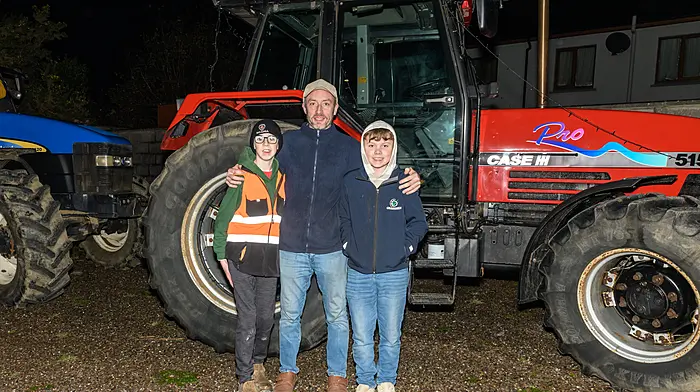 Alex Giles with Vincent and Matthew Harte, all from Rosscarbery, at the Kilmeen Macra Christmas lights tractor run which started at Tots Pub, Ballygurteen Cross and finished in Enniskeane. Proceeds of the run will go to the Irish Cancer Society and Marymount Hospice. (Photo: David Patterson)