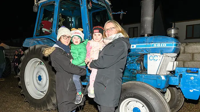 Samantha Quinn and Paddy Coughlan, aged three from Balineen and  four-year-old Rachel and Mags O'Flynn from Ballinascarthy at the Kilmeen Macra Christmas lights tractor run.(Photo: David Patterson)