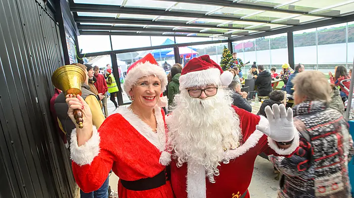 Colette Connolly from Kinsale with Santa at the Blacks Brewing & Distilling Christmas market in Kinsale last Sunday.  (Photo: John Allen)