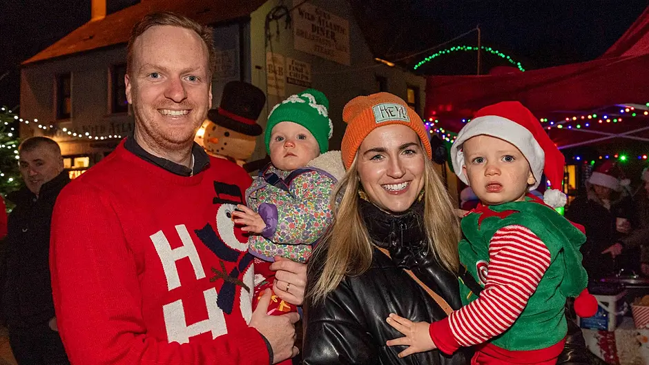 Andy, Bella, Mairéad, and Joshua Macdonald from Clonakilty enjoying the annual 'Lights Up' Parade on Saturday. (Photo: Andy GIbson)