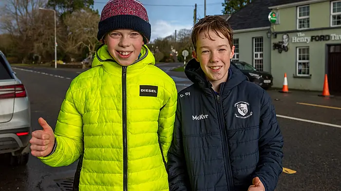 Tomás Walsh (Ahiohill) and Donnacha Ryan (Lyre) were all smiles after completing the 5km walk during the Jingle & Mingle event hosted by Ballinascarthy GAA club last Sunday which finished with a festive event in the community hall with a visit from Santa. (Photo: Andy Gibson)