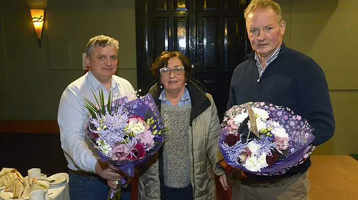 At the annual general meeting for the Bandon Agricultural Show, which was held at the Munster Arms Hotel in Bandon, was Ann Crowley, who stepped down as chairperson being presented with flowers by Don Coughlan (vice chairperson) and incoming chairperson, Dermot O'Leary.  (Photo: Denis Boyle)