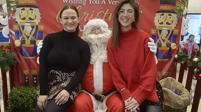 Emma O’Donoghue and Isabel Heaton visiting Santa last Sunday in Bandon. (Photo: Denis Boyle)