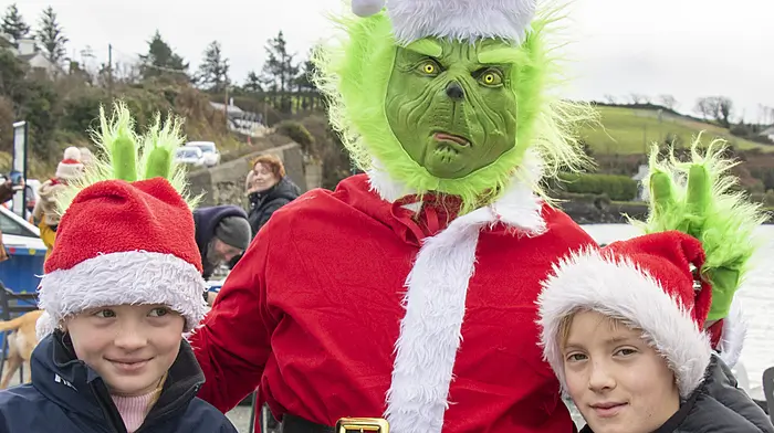 Zach and Ruby O'Donoghue chatting to the Grinch in Union Hall.   (Photo: Andrew Harris)