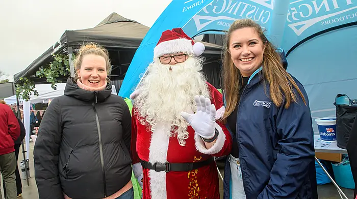 Sarah Lungley and Catriona Graes from Gustings55 in Kinsale with Santa at the Blacks Brewery & Distillery’s recent Christmas market in Kinsale. (Photo: John Allen)