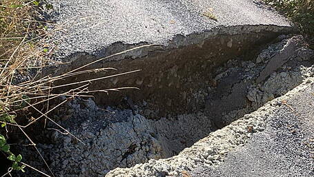 Broken bridge means locals are taking the long road home Image