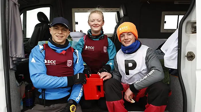 Aidan O'Reilly with Lucy and Daniel Copithorne at the Fastnet Trophy race in Schull. Right: Ciara Crowley, Eve Jasmine Carroll, and Eve Gallagher at the St. Joseph's National School fun run at Liss Ard. (Photos: Carlos Benlayo and Anne Minihane).