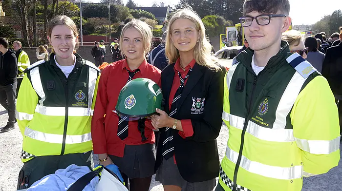 Right: India Hurley Dunne and Freya Scott with paramedics Leigh Farrell and Niall Hankard at the RTC road traffic simulation for Bandon secondary schools. St Brogans college students Katie Jean Cronin, Hallam Tenyson and Kate Westcott with firefighter Bruno R' Silva at the RTC simulation day. Fionnán and Coleman McCarthy from Dunmanway at the Ballinacarriga charity run. (Photos: Denis Boyle & Andy Gibson)