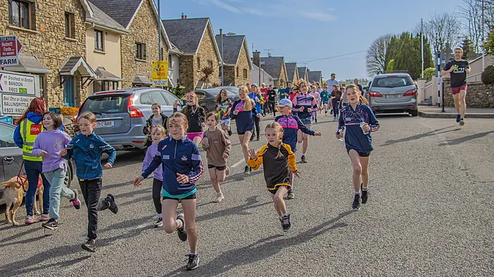 Enthusiastic children break into a run as they leave the village at Kilbrittain National School's annual fun run which raises funds for its autism classes. (Photo: Gearoid Holland)