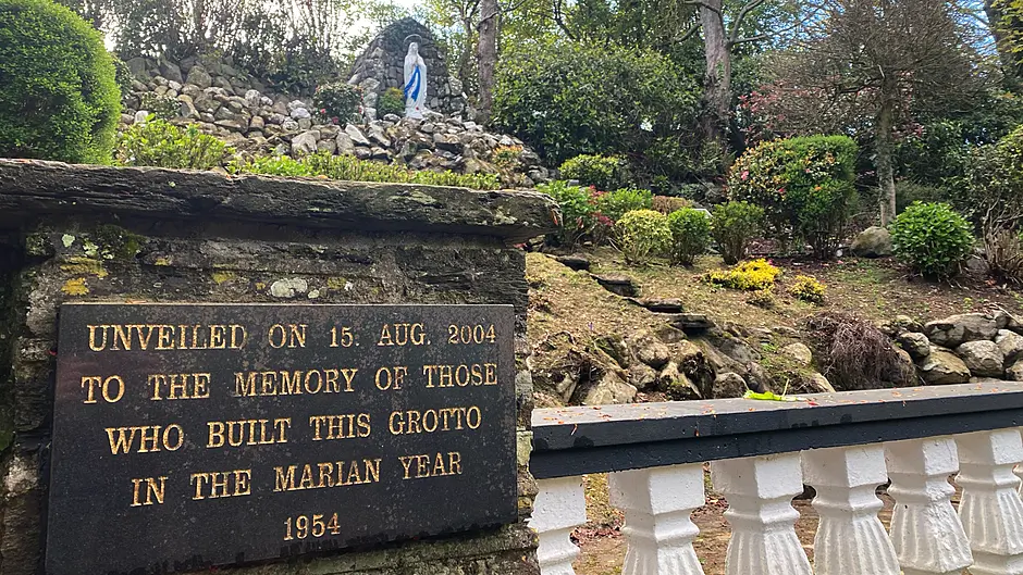Standing in darkness, but seeking the light at grotto Image