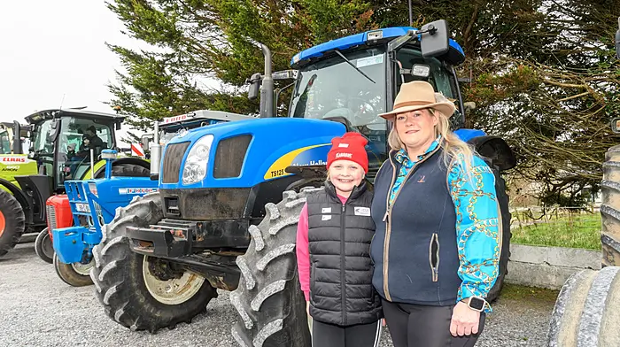 Sinead Barry and Ella Kwoka, both from Rosscarbery, took part in a New Holland TS115A tractor at the Lisavaird Rosemary Calnan memorial tractor, truck and car run. The proceeds will go to Cancer Connect and Lisavaird National School. (Photo: David Patterson)