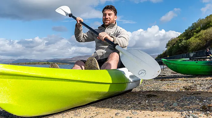 Aaron O'Sullivan, owner of Bantry Bay Boat Hire, giving instructions to the group doing the Easter teen adventure three-day camp, before leading them on a kayaking tour of Bantry Bay. (Photo: Andy Gibson)