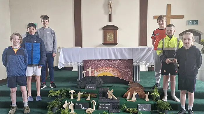 At the Sacred Heart Church in Ballinadee with the Easter garden they built were (from left): Dylan Hayes, Tadhg Mui, Ronan Lynch, Harry O’Donoghue, Gavin Bouse, and Joshua Hayes.