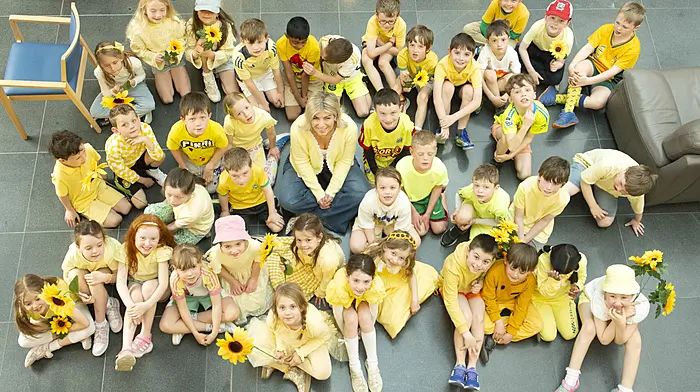 Maeve Dennehy and students of first class from Ballinora National School launching Sunflower Fun Day at Marymount Hospice.   (Photo: Gerard McCarthy)