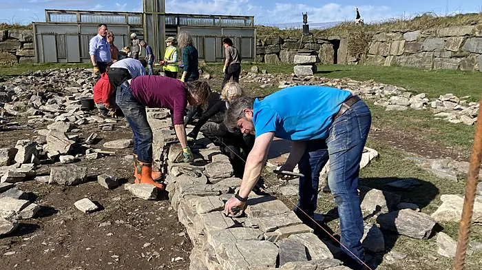 West Cork locals continuing the tradition of building dry stone walls Image