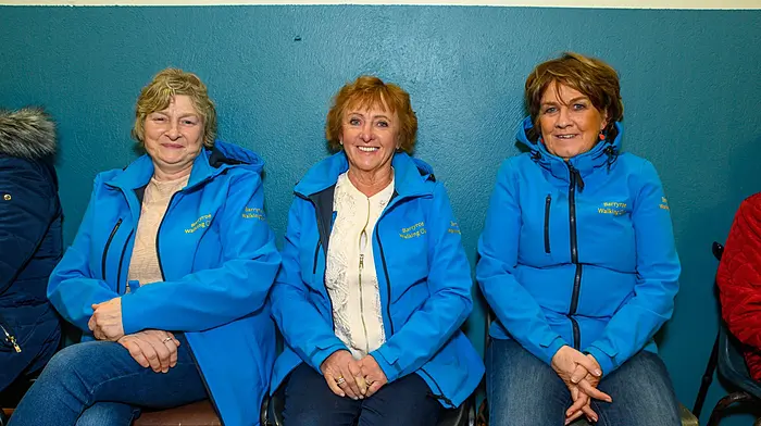 Bridget Deasy, Noreen Fleming and Eithne Lordan from the Barryroe Walking Club at the Community Hall in Castletownkinneigh. Right: Dan O’Leary and Tim Foley were also in Castletownkinneigh for a cheque presentation to Enable Ireland. (Photos: John Allen)