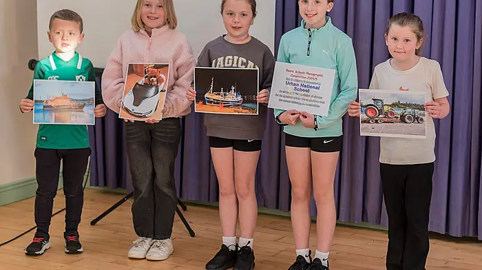 Winners of the Beara Camera Club's Schools' Photo Competition were (L to R) Aidan Harrington, Abby Hainsworth, Chloe Harrington, Croiadh Downing (holding certificate), Maggie O'Shea (holding her brother Jerh's photo).