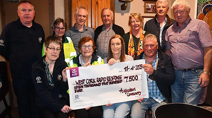 A recent Charity Walk held in memory of local Lisheen man Donie Duggan presented the proceeds of the walk to West Cork Rapid Response at a function at Minihan's Bar in Lisheen. The walk was  organised by Aughadown Community Council and the Parish Pastoral Council a huge crowd turned out to support such a great charity. Members of the Duggan family presented the proceeds.(L-R)  Rhona Deane and Betty Hennessy, WCRR, Donna Duggan, Raymond Duggan, (back L-R)Liam Slattery and Kate Crowley, WCRR, Denis O'Driscoll, Martin O'Mahony, Joss Keohane, Sean O'Driscoll and Mike Keohane members organising committee. Photo; Anne Minihane.