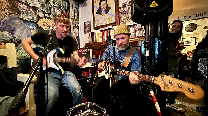 Musicians Enda and Paddy play for an audience at Hacketts pub in Schull. Photo: Carlos Benlayo