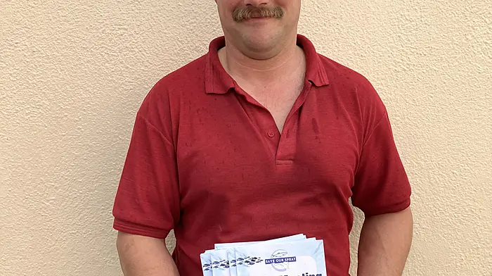 Dolf D’hondt, an avid supporter of ocean and environmental issues, handing out flyers in advance of the Save our Sprat public meeting which will be held on Sunday May 18th at the Westlodge Hotel.