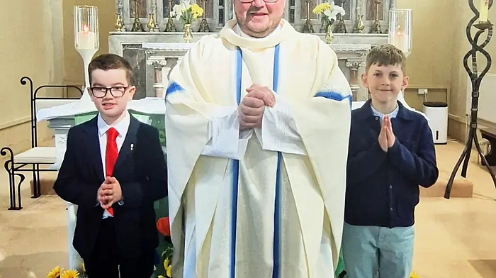 Fr Ben Hodnett with Sean O'Mahony and Hugo Arundel, pupils of Rusnacahara National School in Ahakista, who received their First Holy Communion at the Sacred Heart Church Durrus on Sunday May 4th.