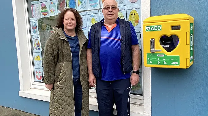 Maura Mannix Secretary and Donal Shorten Chairperson of the Ballineen and Enniskeane Christmas Lights at Drinagh Pharmacy, Main St. Ballineen.
