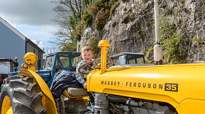 Evan Collins (2) (Clonakilty) checking out a Massey Ferguson 35 at the Leap tractor and car run which was held on a nice sunny Easter Bank Holiday Monday. The run was in aid of Bru Columbanus.Picture: David Patterson, Tractor Run – Cork