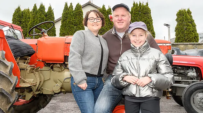 Margaret, Martin and Mollie-Kate McCarthy (Drimoleague), enjoying their day at the Drimoleague tractor, truck and car run. The run was held in aid of West Cork Rapid Response and Bantry Hospice. (Photo: David Patterson)