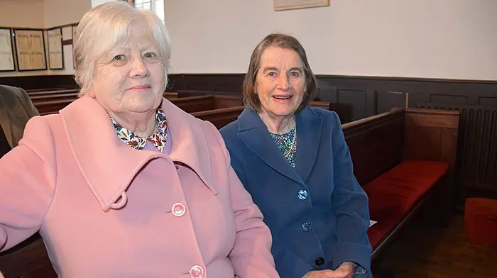 Nuala Fitzgerald and Claire Kenneally enjoying the wonderful singing from  St George's Church Choir, Belfast at St Barrahane’s Church in Castletownshend last Friday evening. The proceeds from the concert will go towards the restoration fund for the church. (Photo: Anne Minihane)