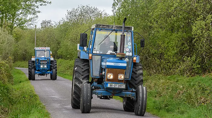 Timmy Leary (Kilbrittain) driving a Ford 6610, followed by a Ford 5000, at the Bandon Grammar School and Bandon Union of Parishes tractor, truck and car run.  The run was held in aid of St Michael's Centre in Bandon and St Fintan's development fund.  (Photo: David Patterson)