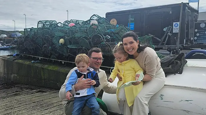 Caption.  XXXXX The O’Regan family, Edel and Richard with children Daniel and Emily  as they discover clue number 10-  'It's here you'll find boats on trailers.  Reverse then launch, farewell sailors.’ at the Easter Sunday treasure hunt