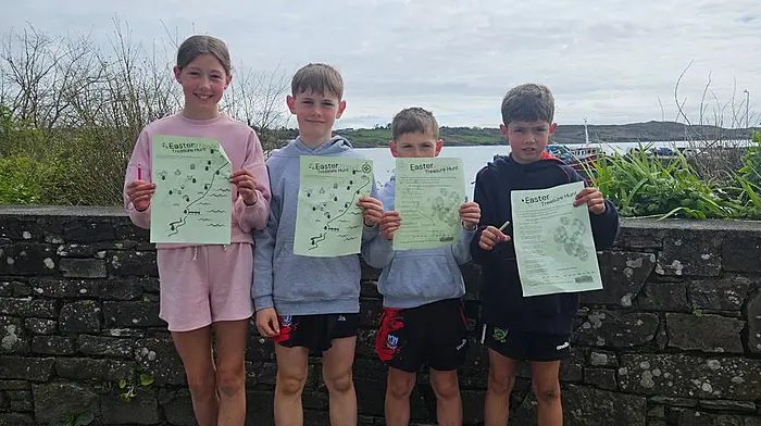 Caption Kayla Cleary, Padraig McCarthy, Cormac McCarthy and Timmy Cleary each armed with their route map and clues for the Easter  Treasure hunt in aid of Schull’s August Regatta pier side amusements.