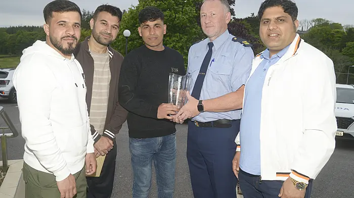 NEWS 9/5/2025 Pictured at the annual West Cork Garda youth awards at the Westlodge hotel Bantry special achievement award winner Bakhar Nabi, Clonakilty with Garda Liam Ryan and Muhammed Zishan, Nezamuddin Nabi and Arifgul Habi Amir. Picture Denis Boyle