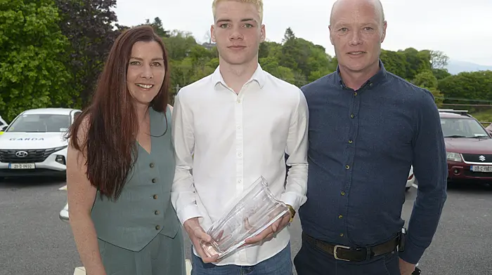 Overall award winner Evan Collins from Skibbereen with his parents Tom and Laura.