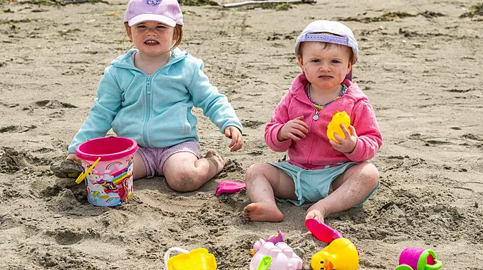 Left: Sarah and Rosie Harrington from Caheragh at Harbour View Beach. Right: Suzanna Donovan and Rachel O'Boyle from Leap at the annual fiddle fair in Baltimore. (Photos: Andy Gibson & Denis Boyle)